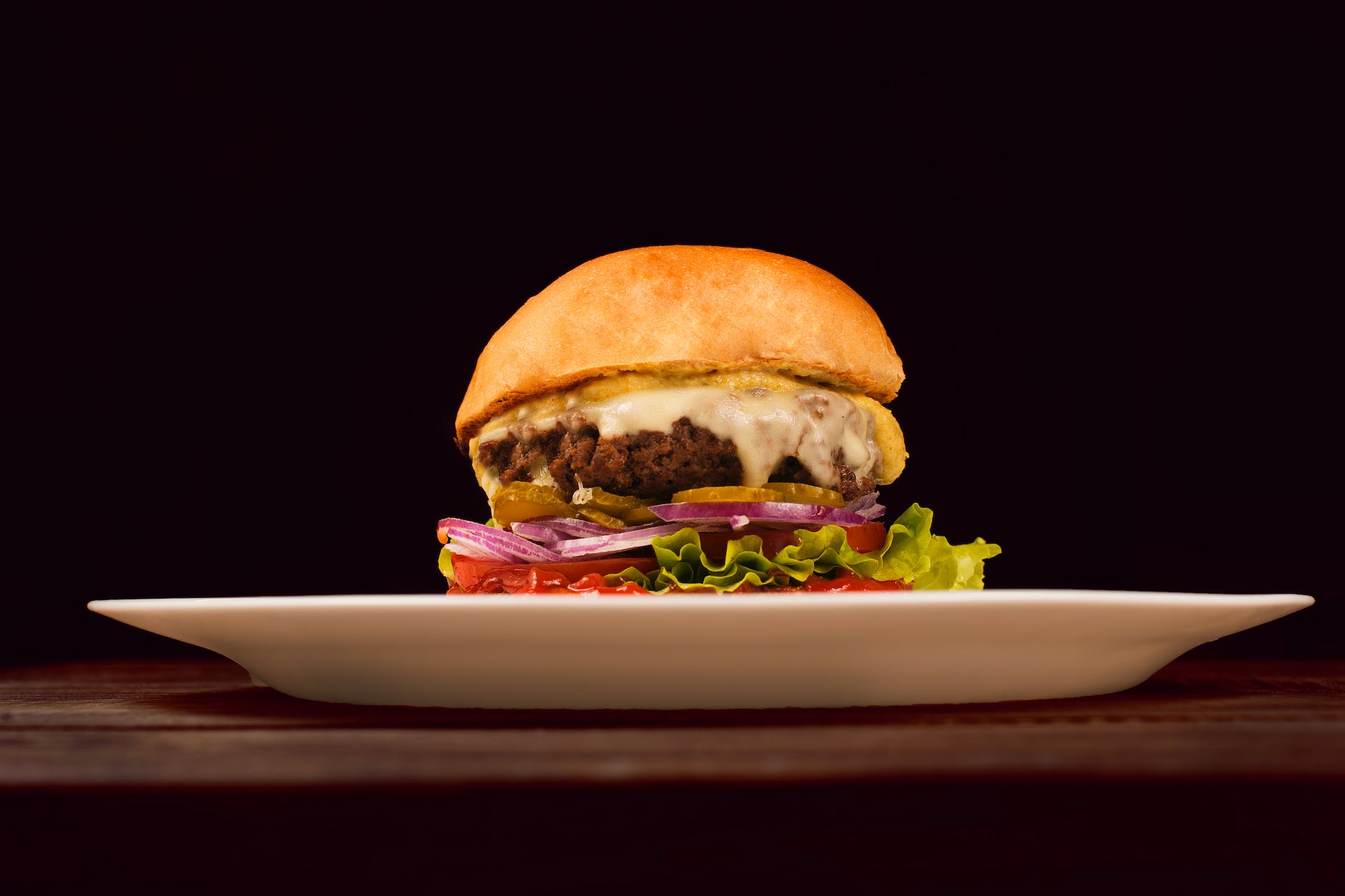 close up photo of a cheeseburger